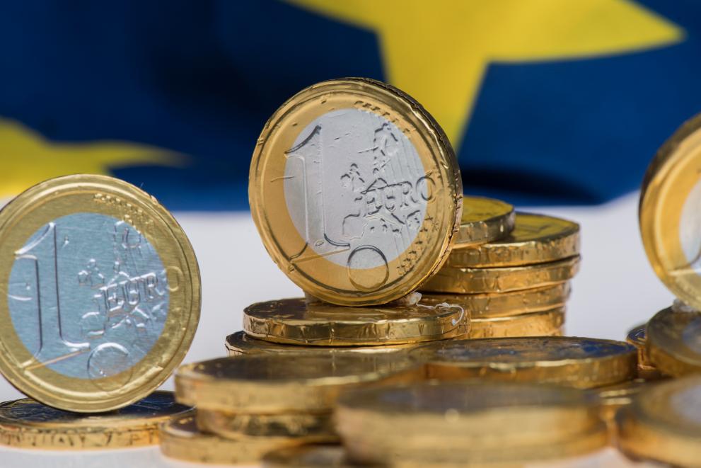 Euro with miniature figurines