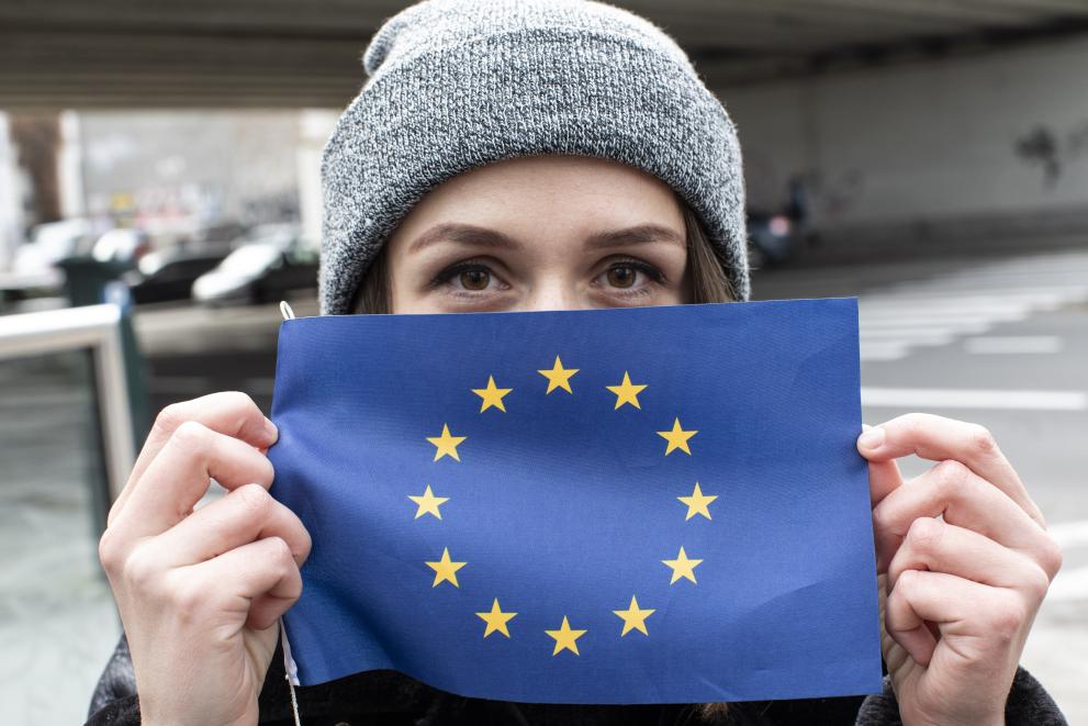 Young people and European flag