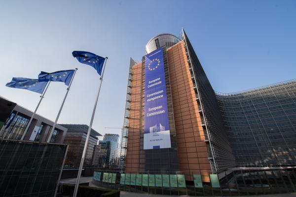 Views of European flags in front of the Berlaymont building in Brussels